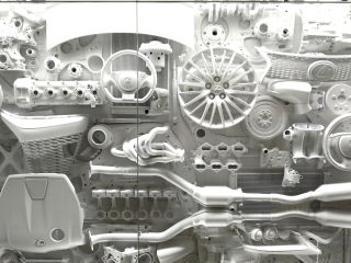 An art installation of sculpted car parts