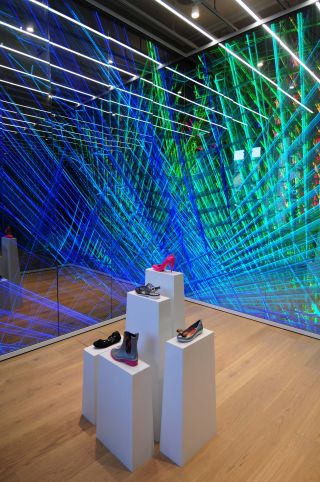 The entrance is an LED multimedia installation with 65 screens which play constantly changing patterns and colours