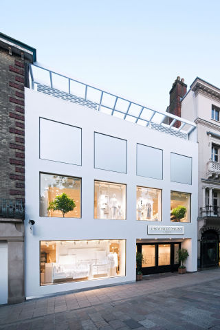 A striking, crisp and contemporary three storey facade sets the tone