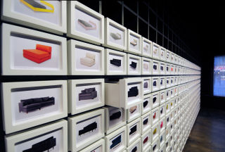A wall of 600 postcards allows Made to display its full range.