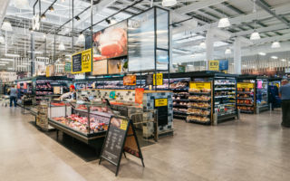 A fresh food market is put at the centre of the concept including a butcher and baker usually consigned to the supermarket perimeter - Tesco, Swansea