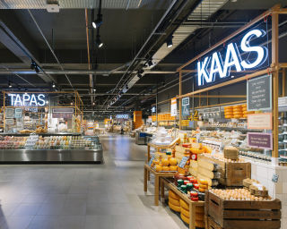 The fresh market is the heart of the store, with each island a manned foodie station