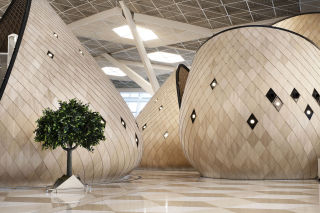 Autobahn created these surreal cocoon pods at Heydar Aliyev Airport in Azerbaijan