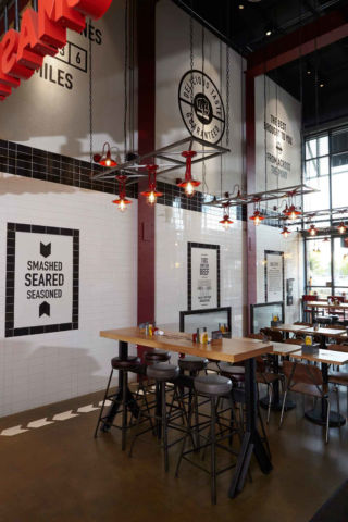 Caulder Moore uses a new interior design and urban typography, to confidently communicate the heritage and story of the Smashburger brand, for its launch into the UK