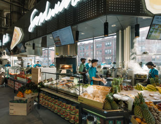 Fresh produce and deli products double as decor to underscore the brand’s self-styled “freshified” focus.