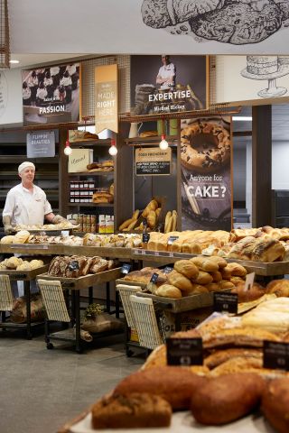 Tiers of freshly baked, artisanal style bread recreate the traditional bakery experience.