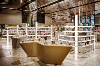 Boldly styled displays lend texture and movement to the store’s beauty department.