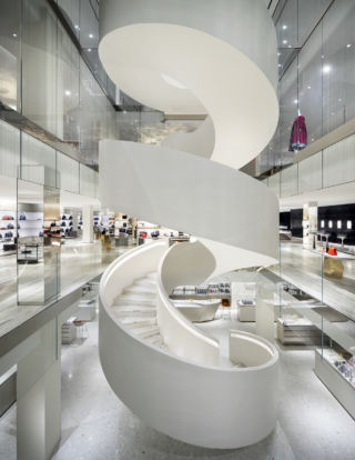 A striking spiral staircase connects each of the store’s five storeys.