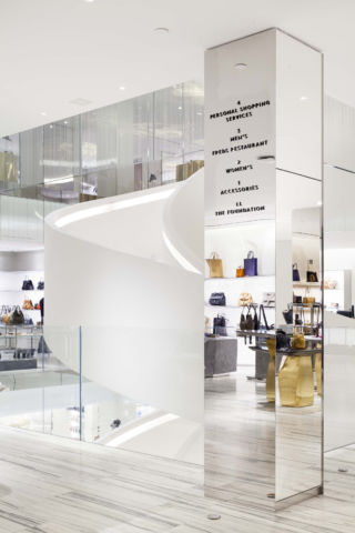 Mirrored signage and glass walls create additional expansiveness.