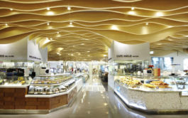 Ceilings and lighting guide customers to destination points around Shinsegae's department store