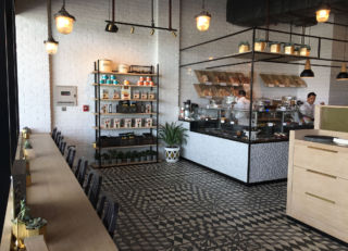 Gluten free bakery Tawa in Abu Dhabi has a clean cut simple Scandinavian aesthetic, providing a light and spacious feel to the cafe 