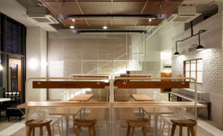 Café Cconal mixes sports locker room with domestic furniture for this relaxed café concept

