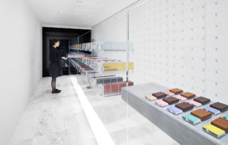 Belgian chocolatier BbyB's first store in Japan, where the products appear to be suspended in mid-air