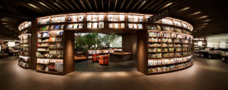 The circular design of the bookshelves creates a social reading hub in the centre of Tsutaya's Umeda T-SITE bookstore