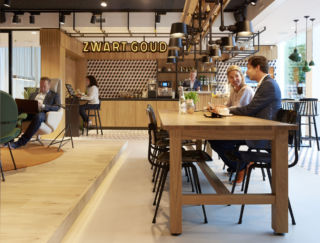 Customers can wait, work or meet with bank staff in the open-plan space.