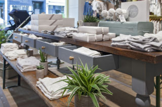 Minimalist product arrangements highlight the curated nature of the store. 