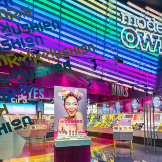 A neon shop façade creates a bold judgement-free, club-like atmosphere.