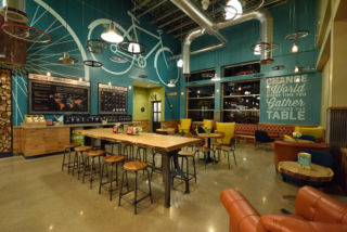 Blueprint graphics reflect the industrial heritage of Dayton, in Whole Foods localised concept