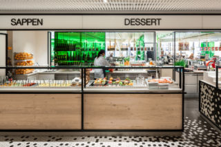 Glass walls and displays allow glimpses of ingredients.