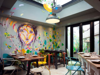 Graffiti artist Milo was commissioned to create an artwork for Tootoomoo's restaurant