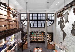Shinola Tribeca NY, great use of the space's interior height and window feature, which draws customers to the back of the store 