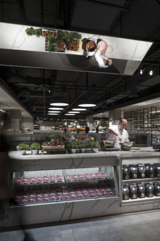 Angled mirrors let consumers participate in the theatre of food preparation in David Jones' food hall Sydney