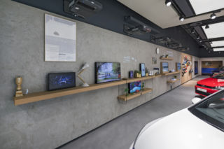 An interactive display wall features VW artefacts and tactile moments.