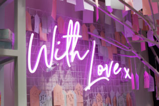 The 'With Love' theme informs the upbeat design.