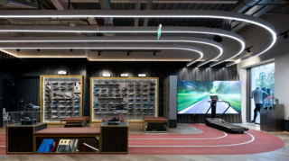The running track in Life Style Sports store, creates focus on the gait analysis lab, where shoppers can personalise trainers to their gait. 