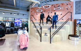 The use of steps, in Life Style Sports' Cork store, effectively mimics sports stadium seating and sets a dramatic staging for mannequins