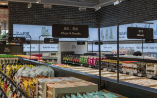 The low fixtures and signage enable shoppers to see across the store, improving navigation and the overall shopping experience.