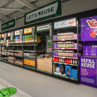 The 'Refill Zone' is the store's focal point where customers can buy loose goods. 