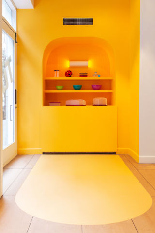 The store has a vibrant Pop Art feel, the bold colours provide a perfect backdrop to Tupperware's ranges.