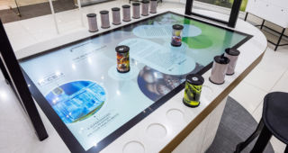 Leveraging RFID lift and learn tech to activate immersive content, Cannabotech's interactive and touch-sensitive table enables customers to learn about the blends of ingredients, product benefits and the science behind the formulas.
